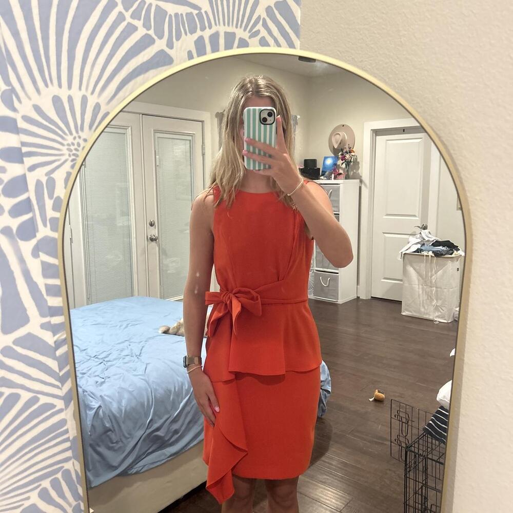 Red business dress with tie